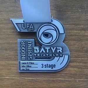Медали для четырёх этапов indoor триатлона Батыр